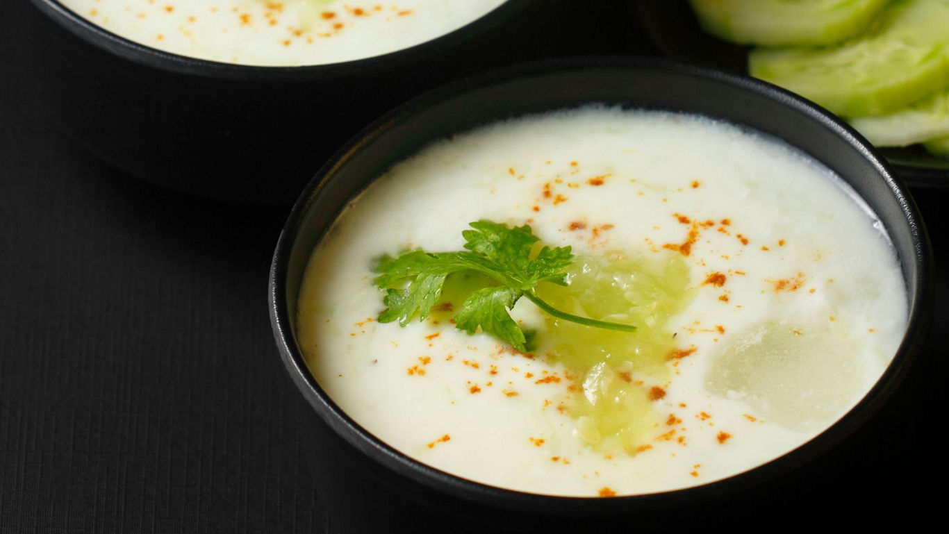 Cucumber Raita with Yogurt Garnished with Cilantro