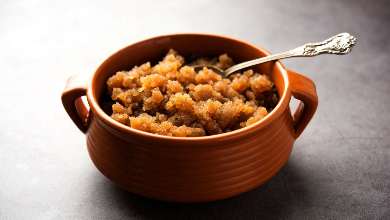 Traditional Indian Sweet Halwa in Brown Ceramic Bowl