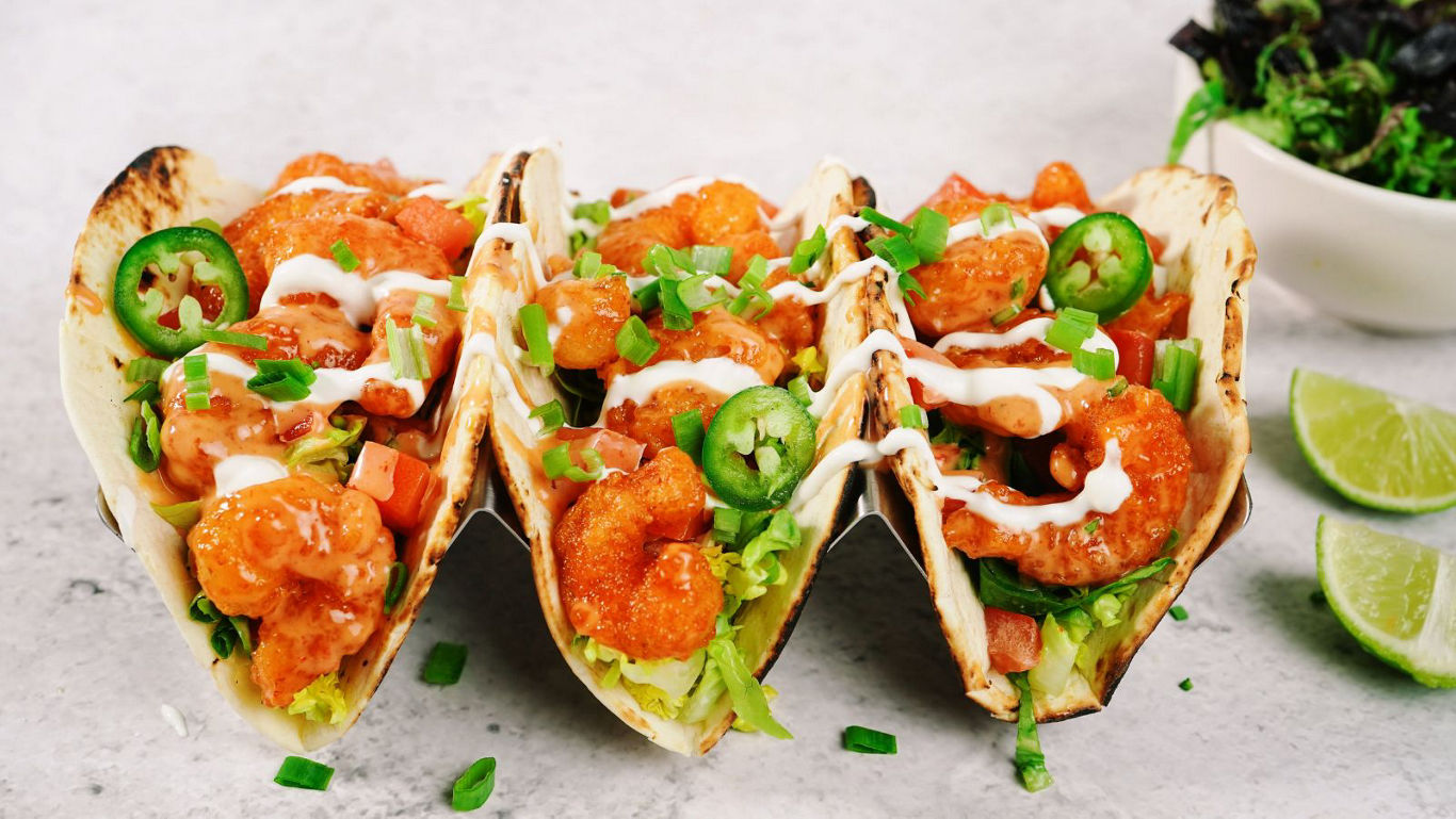 Spicy shrimp tacos with fresh toppings