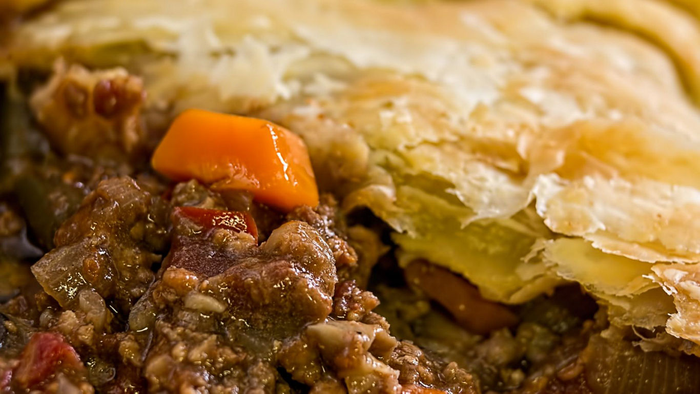 Close up of hearty meat pie filling
