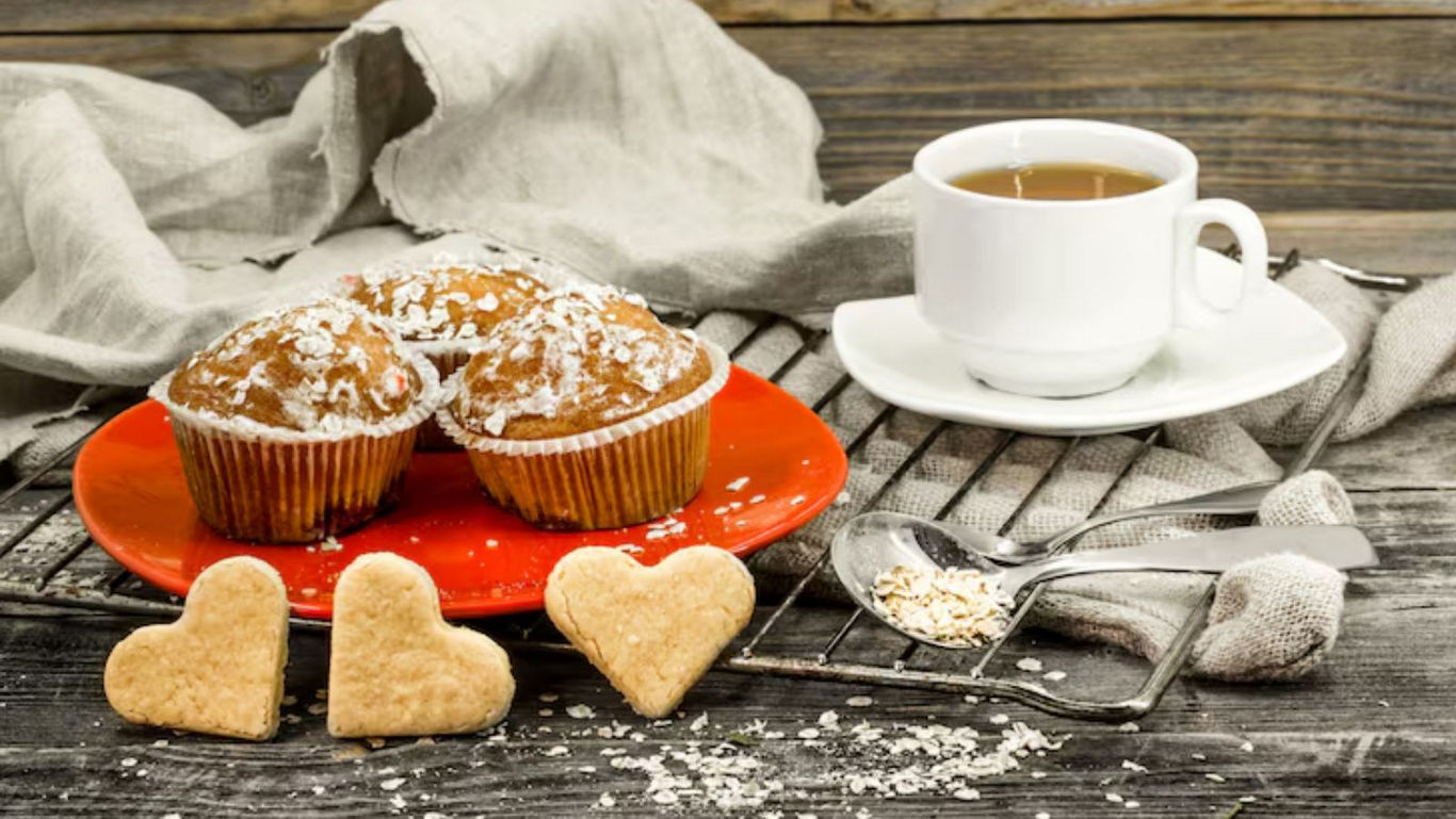 Muffins and coffee on rustic wooden table