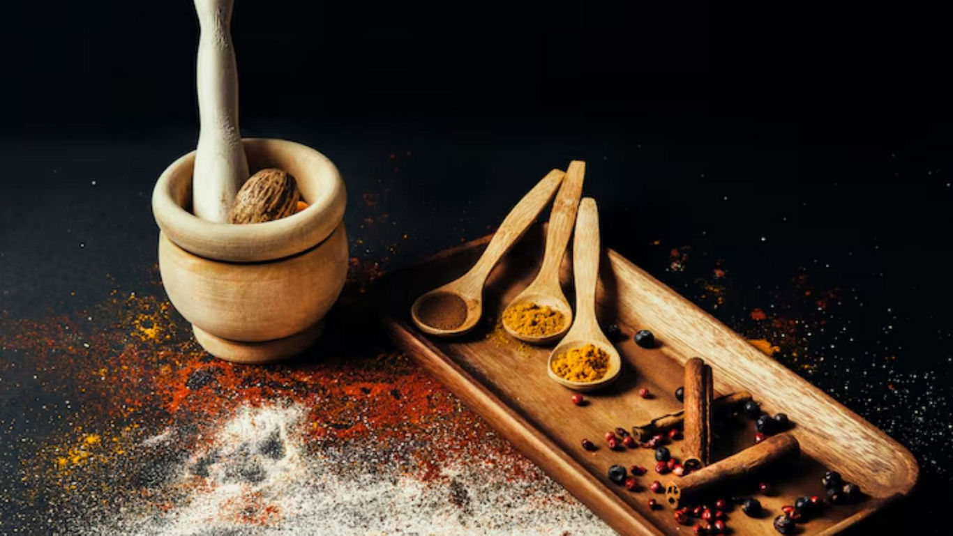 Wooden spice tools with vibrant powders