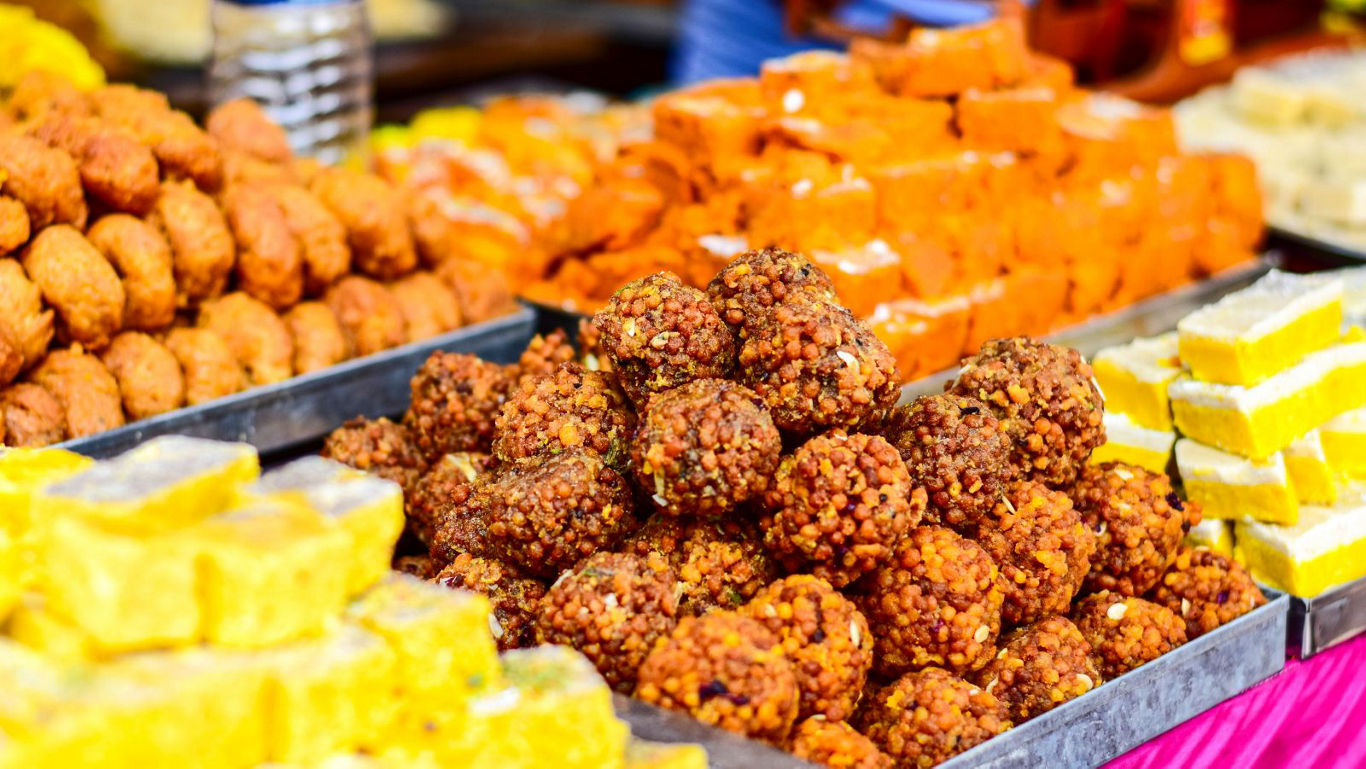 Assorted Indian sweets on display at market