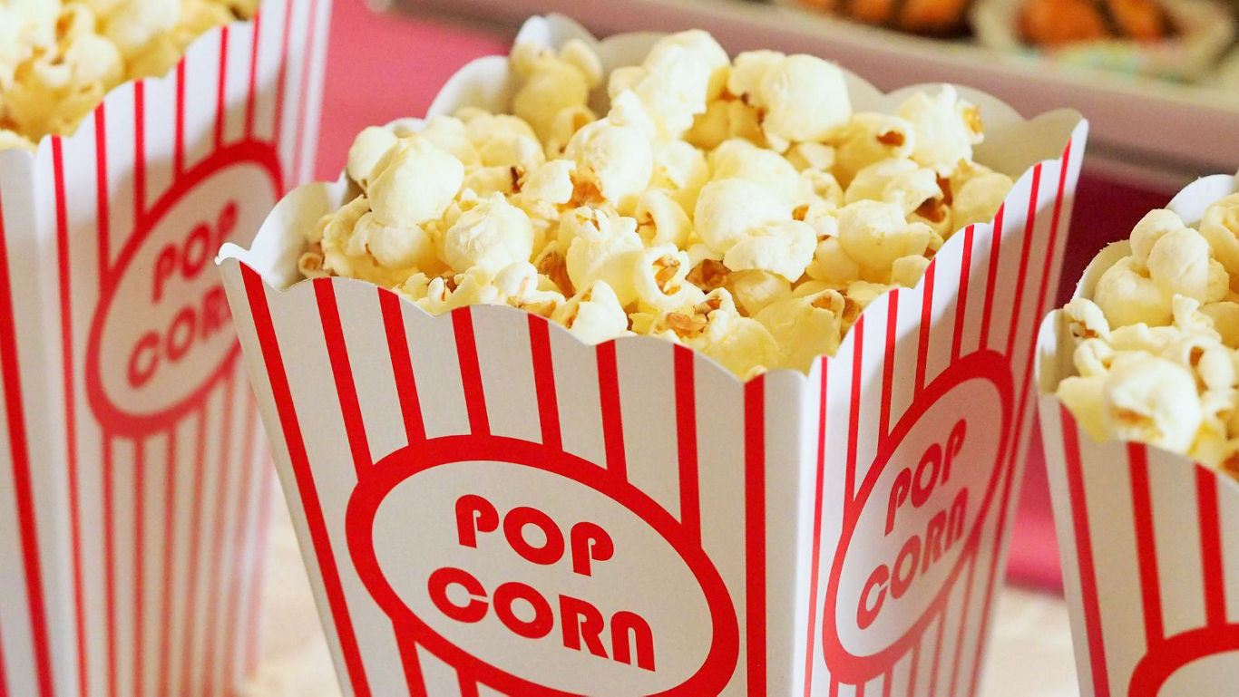 Striped popcorn tubs at movie concession stand