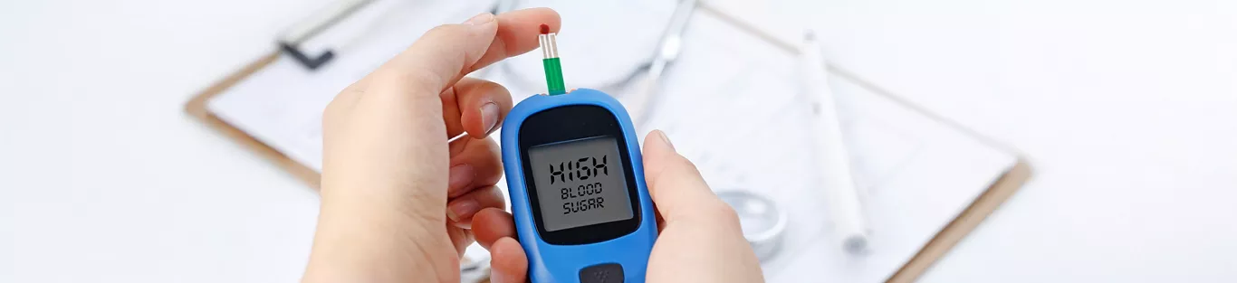 Glucose meter showing high blood sugar