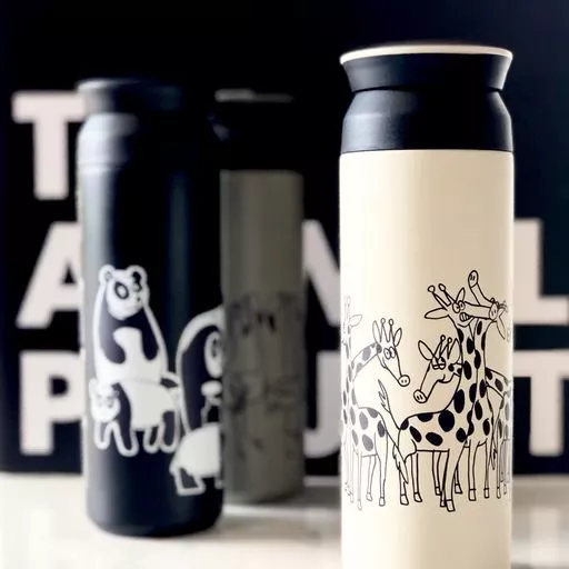 Travel tumblers featuring animal drawings