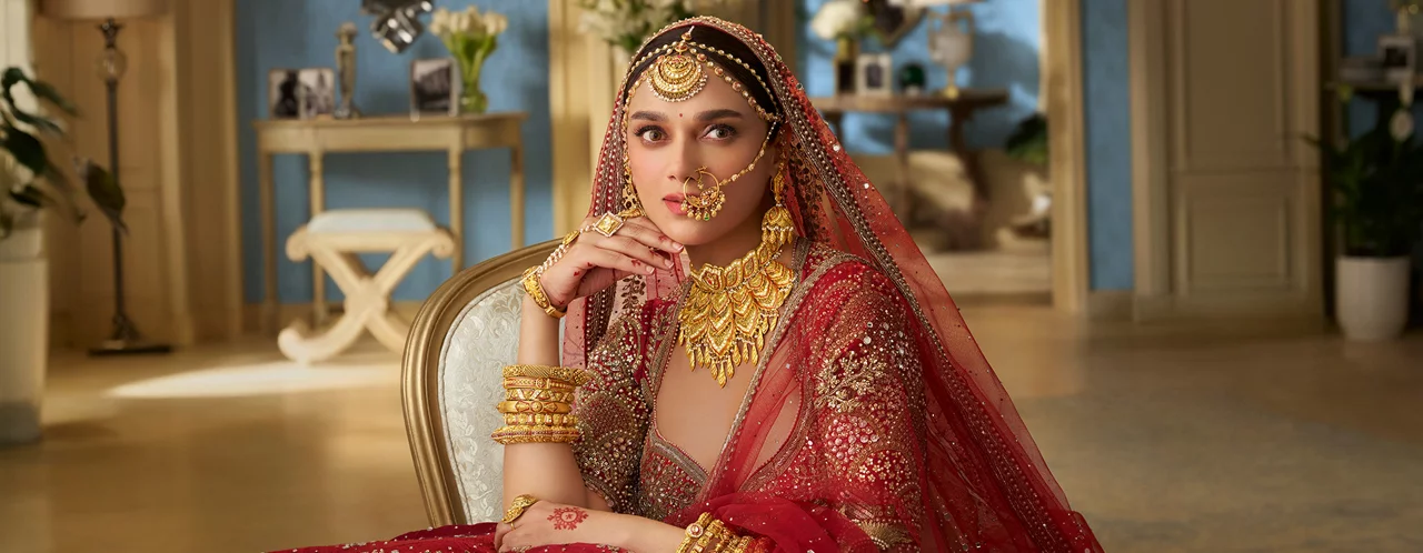 Two women in glamorous outfits with elegant jewellery