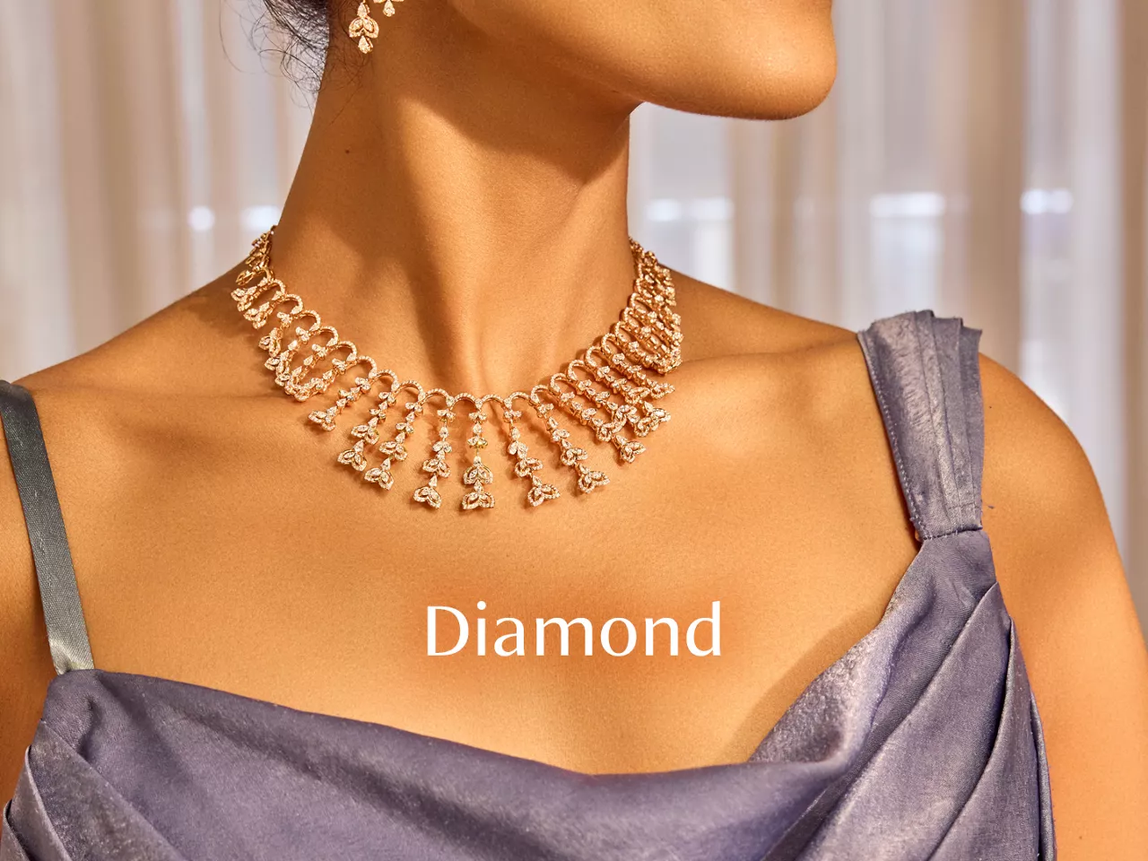Woman wearing elegant diamond drop necklace in lavender outfit with "Diamond" text.