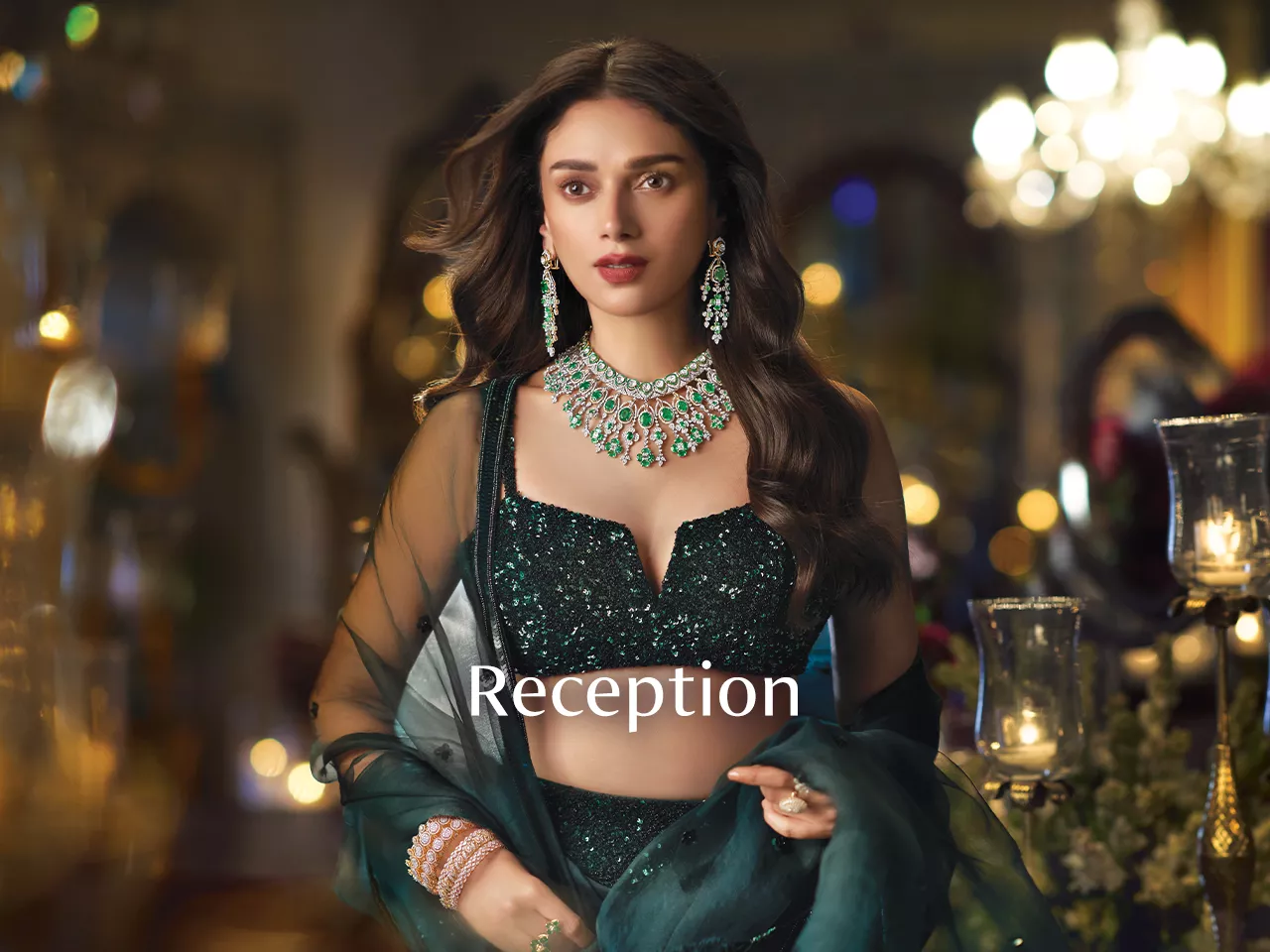 Woman in dark green sequin lehenga with emerald diamond jewellery and "Reception" text.