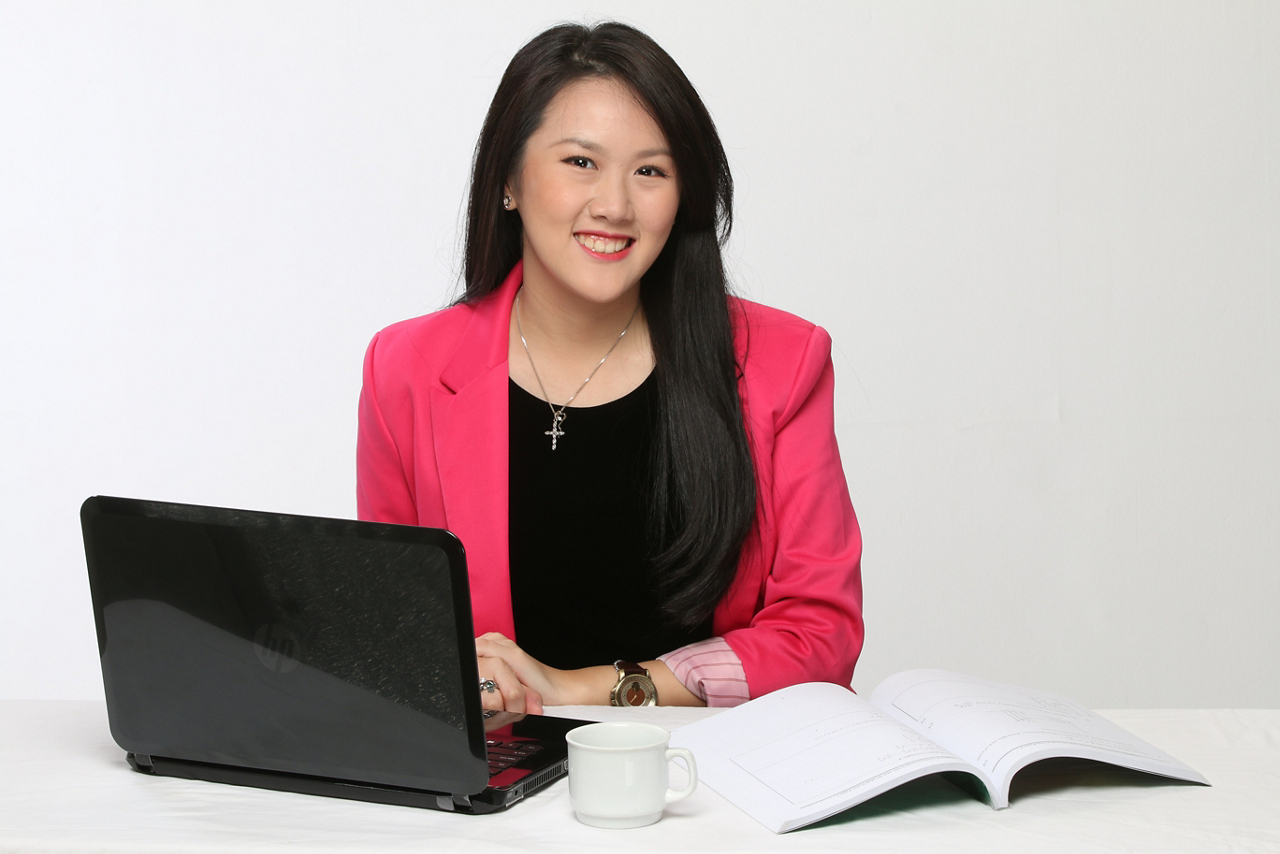 A young woman smiling