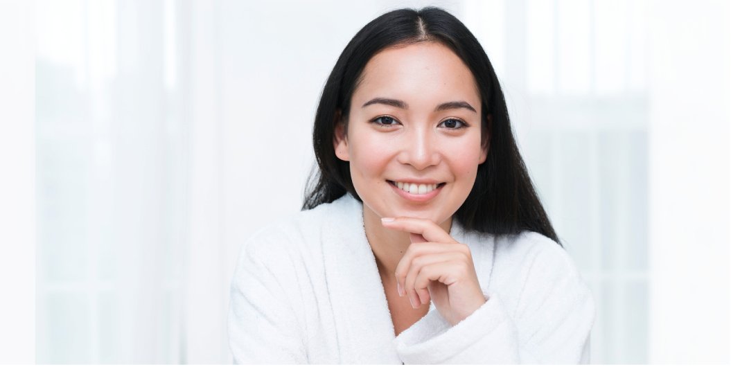 A young woman smiling