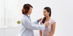 A doctor checking her patient