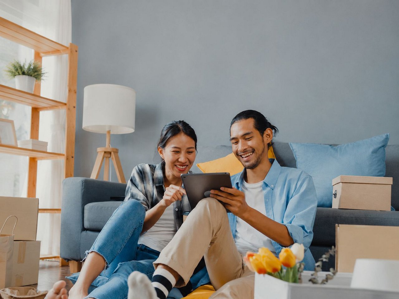 Two people discussing over the tablet.
