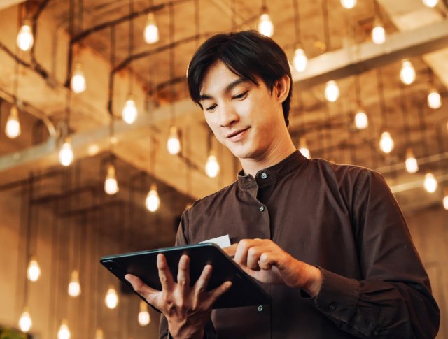 man reading document