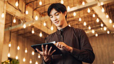 man reading document