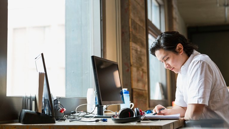 Entrepreneur working in creative office space