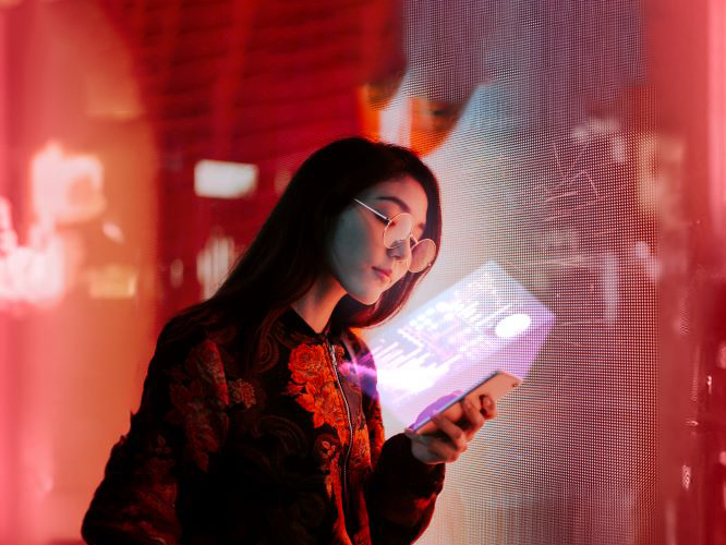 A woman looking at her phone