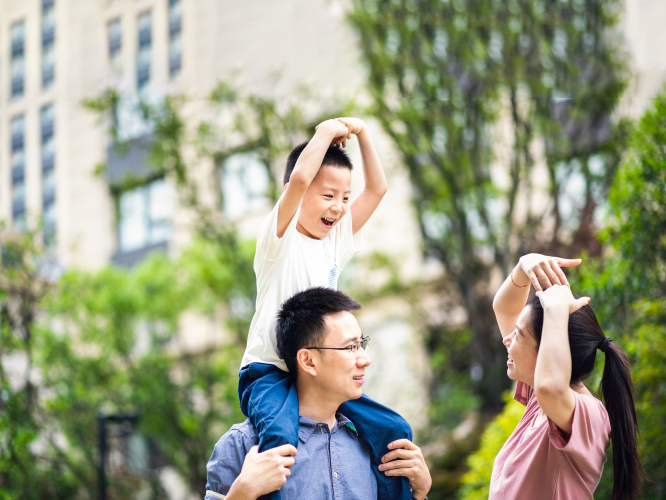 Family strolling at a park