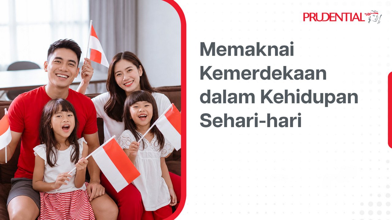 A smiling family of four sits together indoors, each holding an Indonesian flag. The parents and two children wear casual red and white clothing that matches the national colors. Text in Indonesian reads "Memaknai Kemerdekaan dalam Kehidupan Sehari-hari" beside the family. The overall layout is bright and clean, with a white background and red accents.