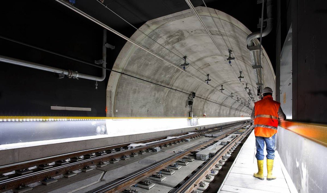 A person working on the rail