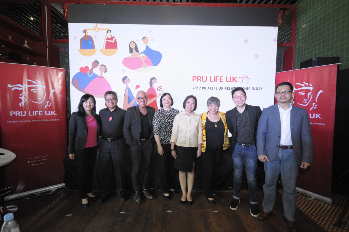 Executives posing along with the panelists
