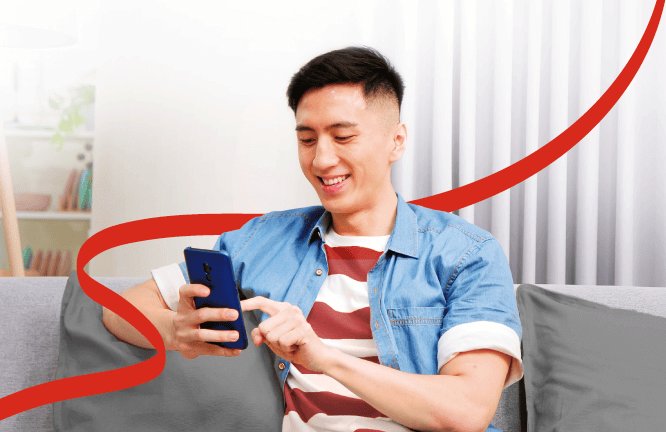 A man using cellphone happily