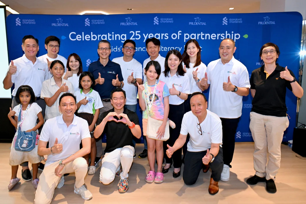 Standard Chartered and Prudential Singapore celebrate 25 years of partnership with joint commitment to empower the next generation by imparting knowledge on money management and financial responsibility