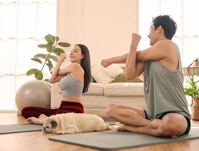 father and son playing soccer