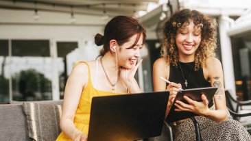 friends working happily