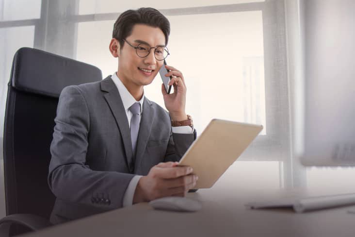 a man talking on a phone