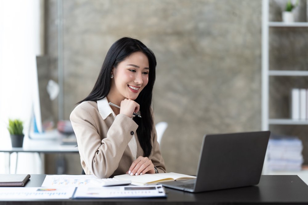 a woman happy with her financial status