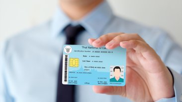 a man showing ID card