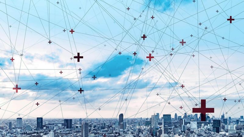 medical red cross symbols connected in the sky