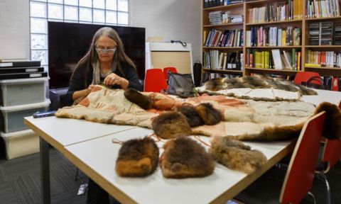 Dr Vicki Couzens, prominent Indigenous artist and RMIT researcher, stitching a blanket