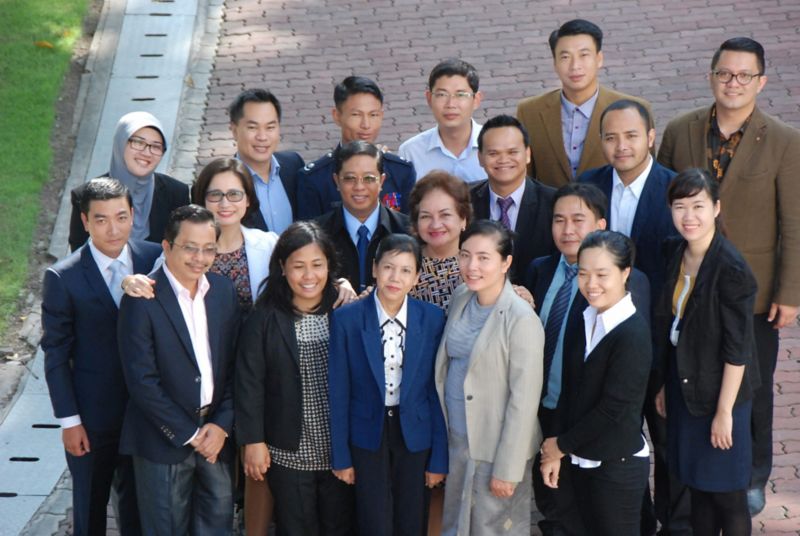 transnational security centre team posing in the courtyard