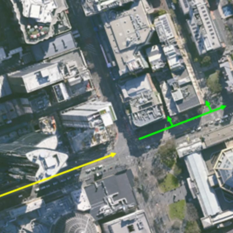 A bird's eye view of Bowen street with yellow and green arrows