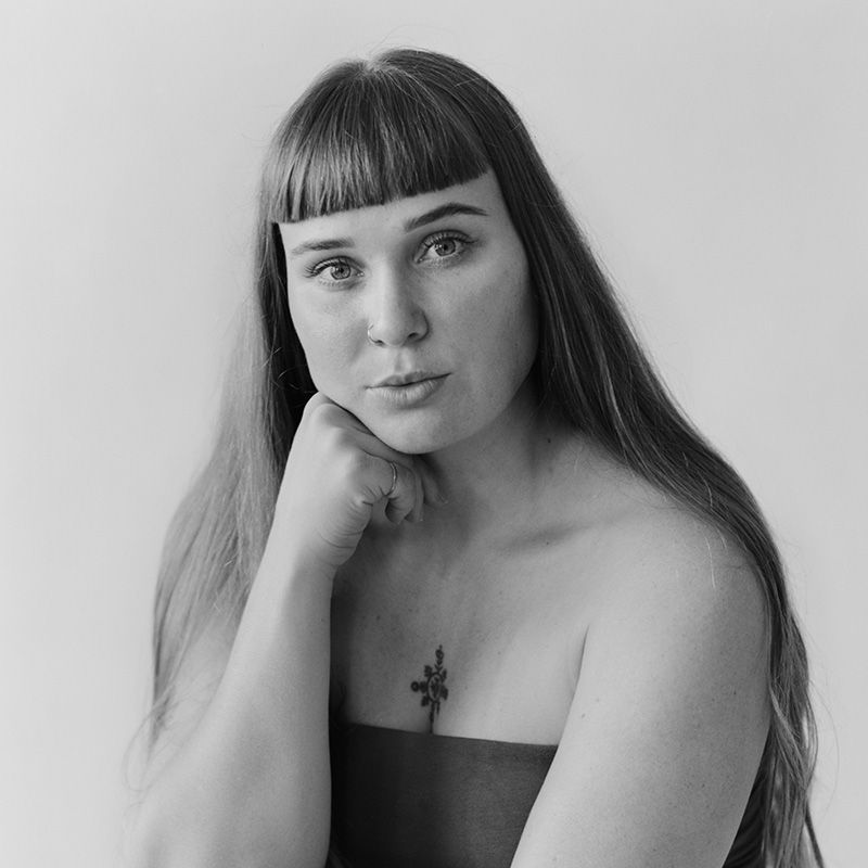 A black and white headshot of Bachelor of Arts (Photography) graduate Teva Cosic.