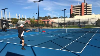 Students playing tennis at RMIT sport facility