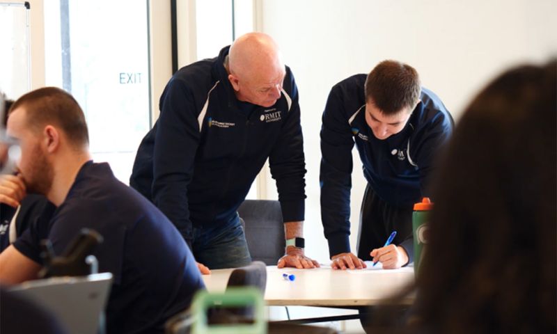 Cricket Victoria presenter speaking to a classroom full of students