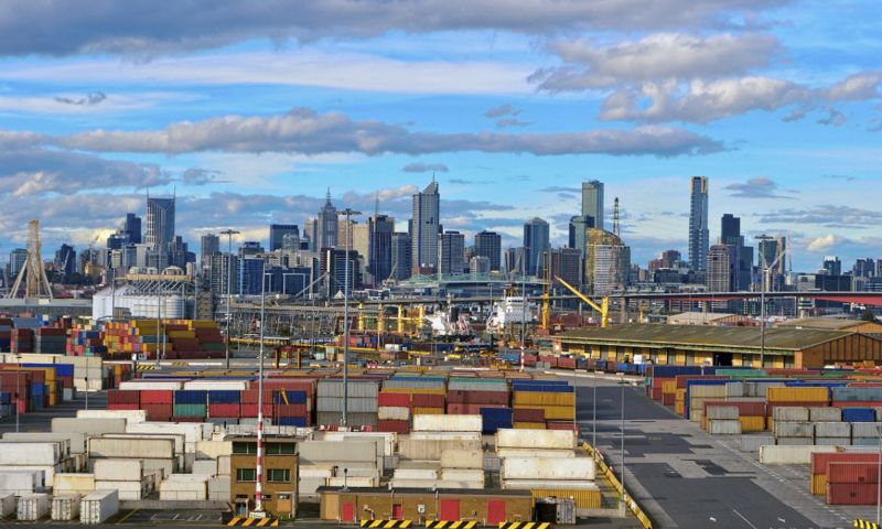 Melbourne city scape skyline with shipping containers in the foreground