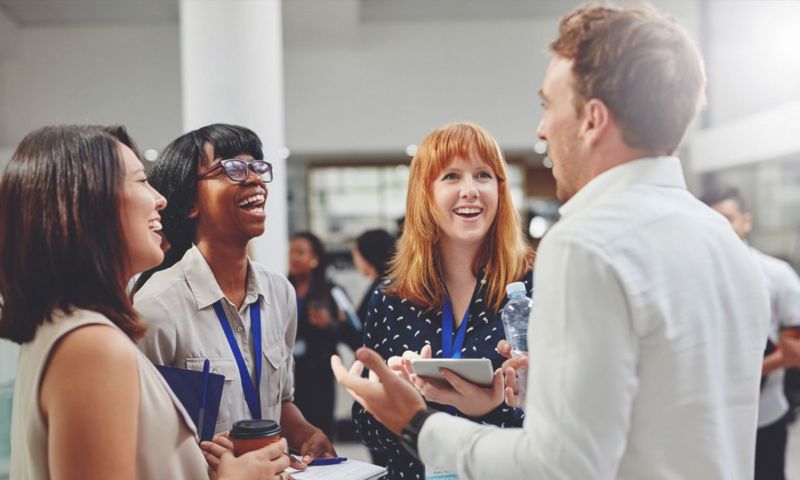 People talking at an event