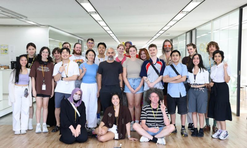 Image of a group of people posing for a photo.