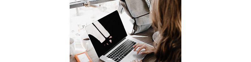 Lady working on a laptop