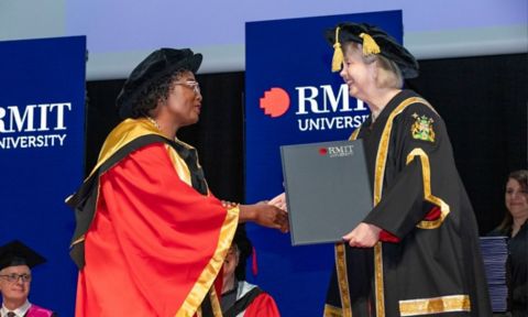 Honorary doctorate receiving their testatmur at the Doctoral Degrees Graduation Ceremony.