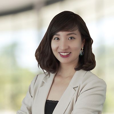 a headshot of a woman smiling 