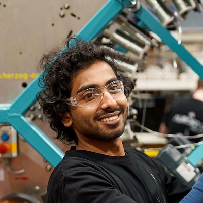 Male engineering student with safety glasses.