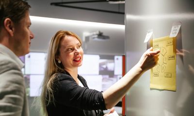 Woman pointing at diagram