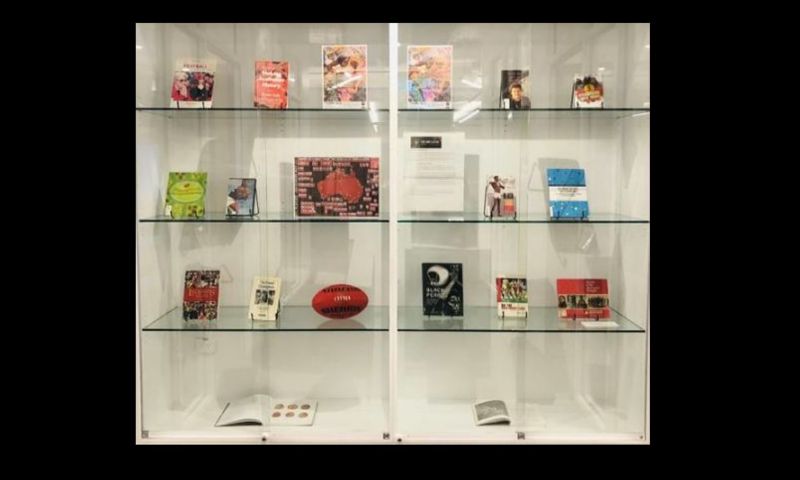 Photo of a display case with books.