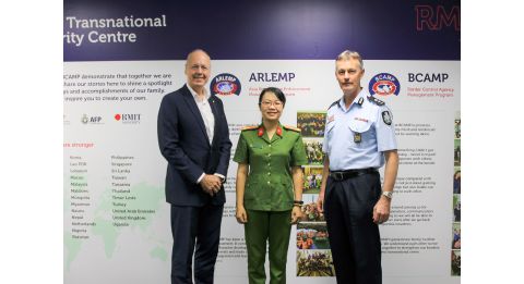 transnational security centre team and police posing together