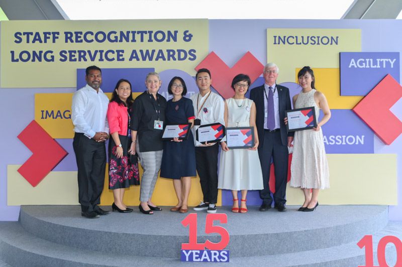 Awardees from the Experience team with leaders from their portfolio and the University. 